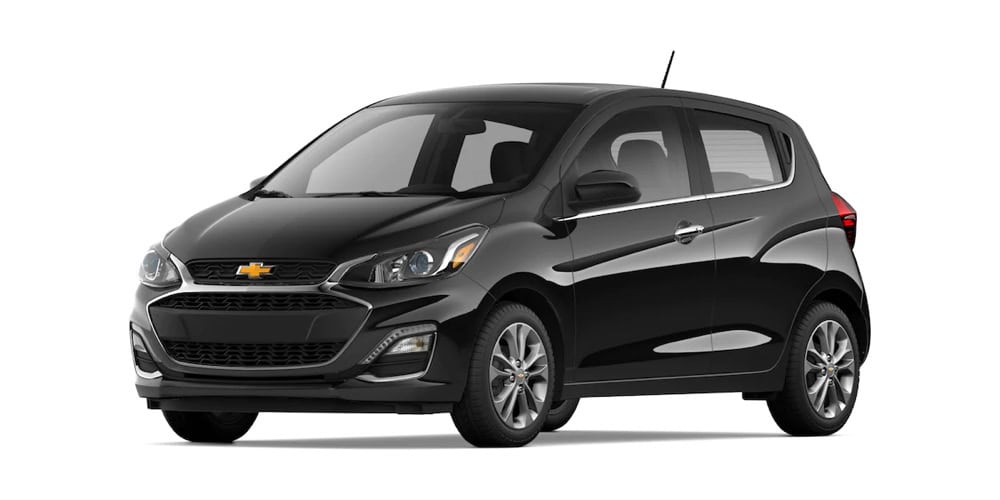 Compact black Chevrolet hatchback rental car in Curacao for easy city driving and island exploration.